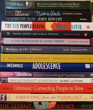 Pile of books about therapy
